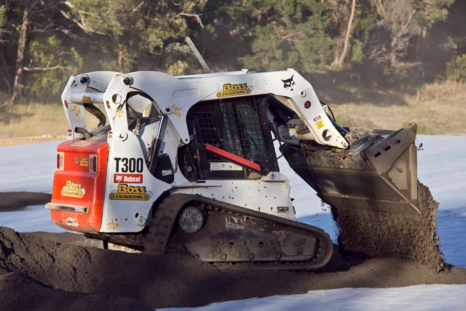 Installing horse arena base