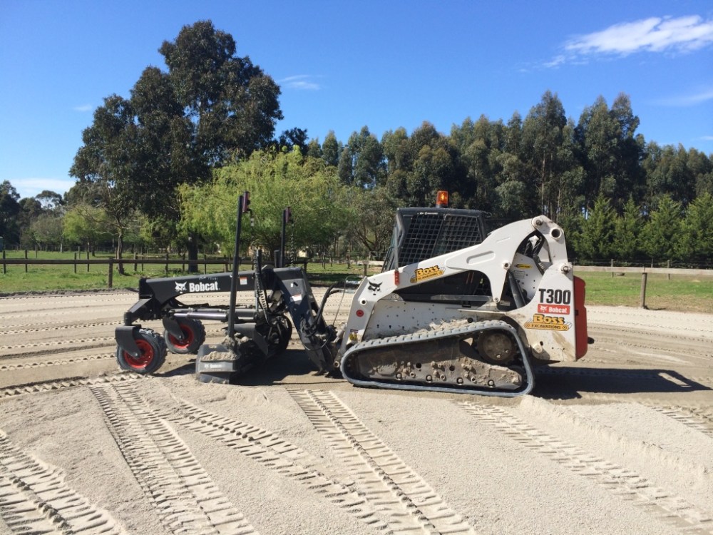 Laser-grading sand horse arena