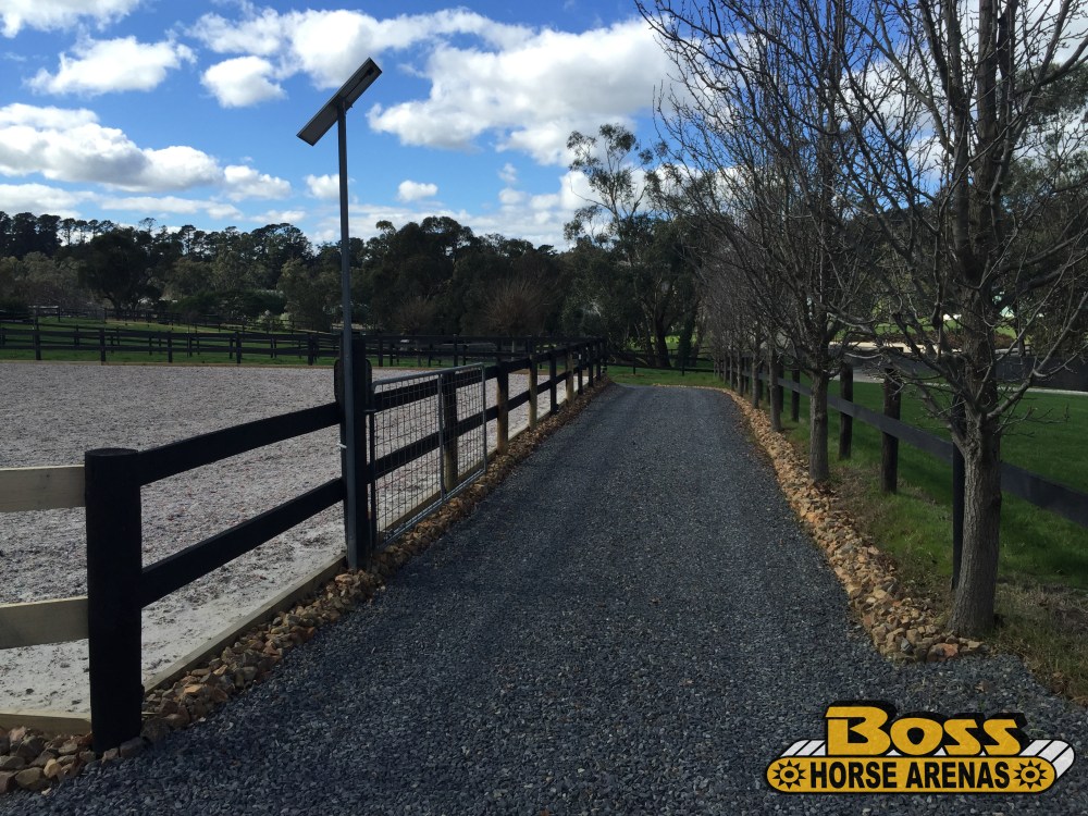 Crushed rock driveway and geotextile horse arena