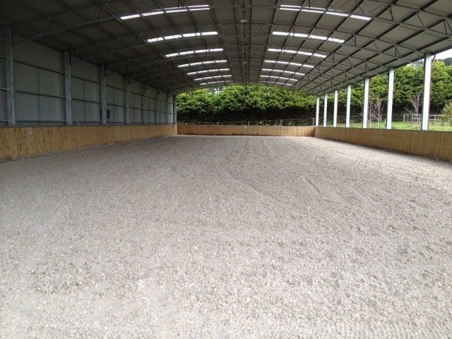 Geotextile indoor horse riding arena